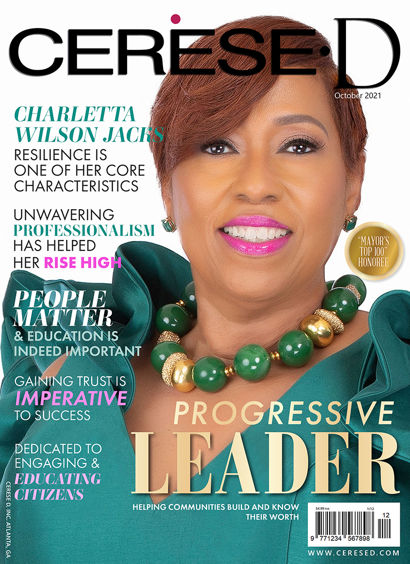 Charlette Wilson Jacks is a community leader in green top with chunky green and gold necklace on a magazine cover